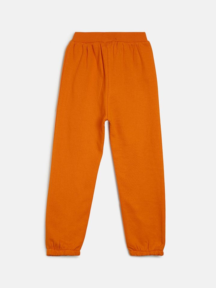 Orange jogging bottoms store
