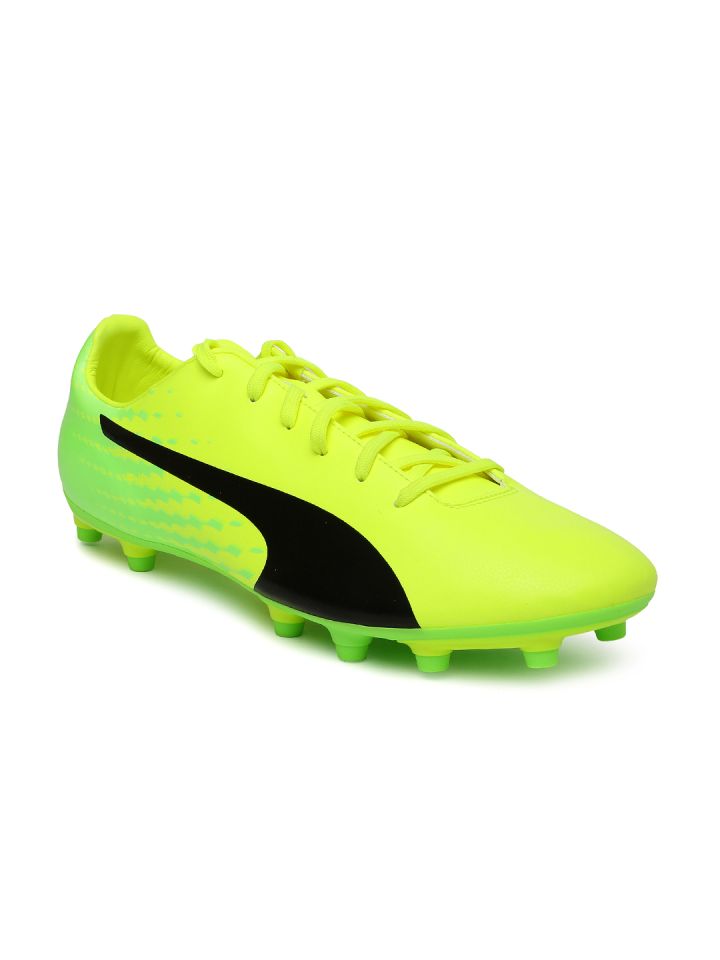 Puma green football shoes store