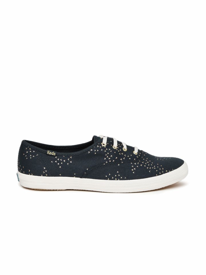 navy blue and white keds