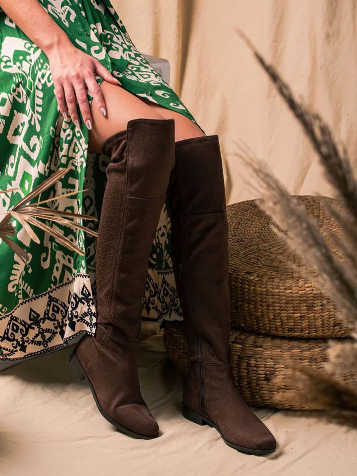 Thigh high cheap boots myntra