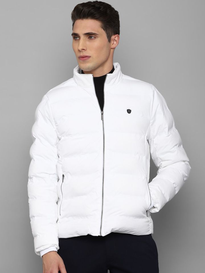 White puffer jacket shop with black zipper