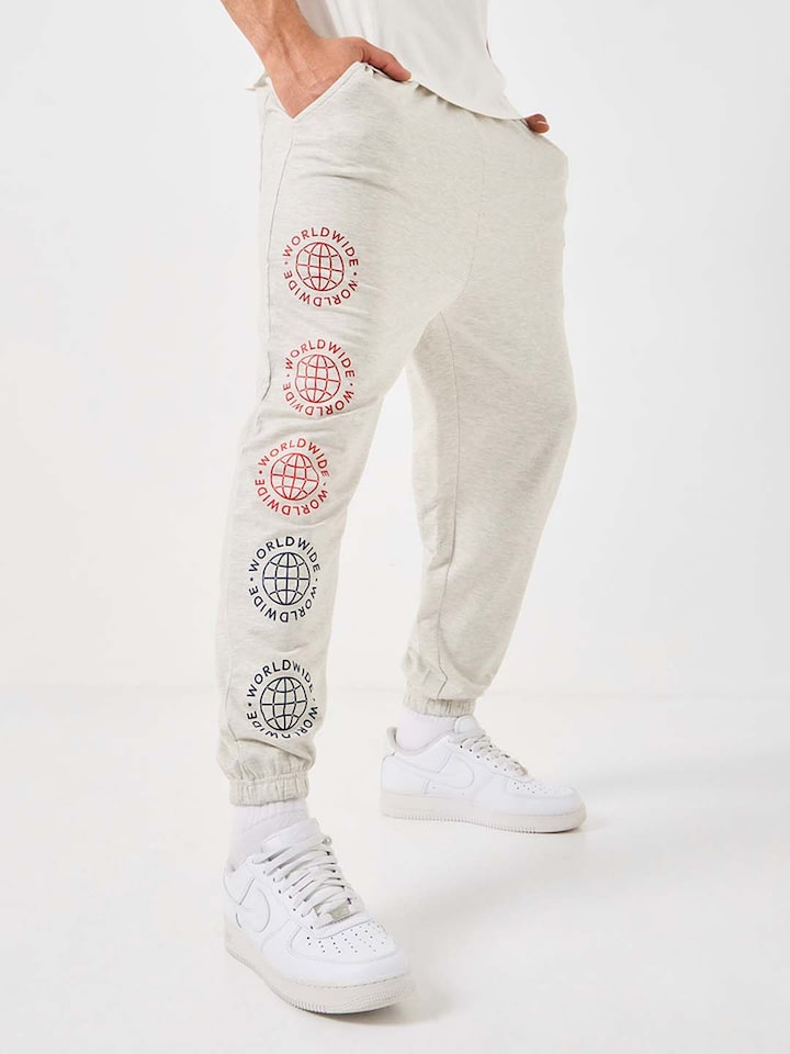 Buy Styli Men Cream Side Placement Print Oversized Joggers - Track Pants  for Men 20739950