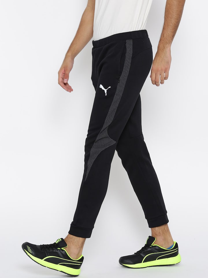 contant geld zacht motor Buy Puma Black Evostripe Ultimate Track Pants - Track Pants for Men 2082715  | Myntra