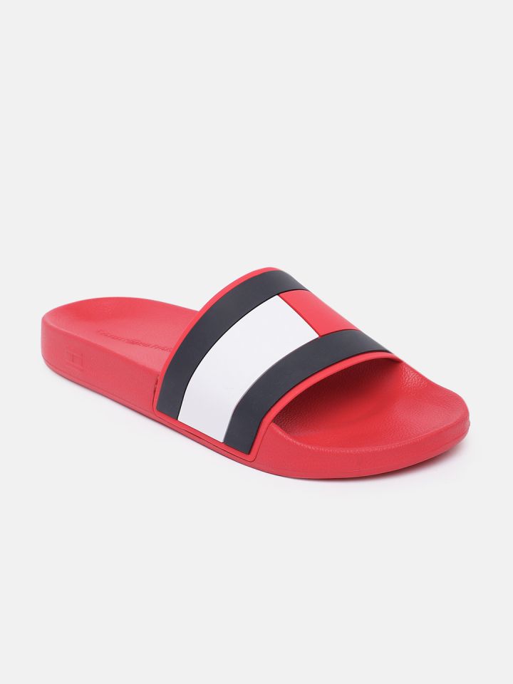 Tommy hilfiger redder slides sales