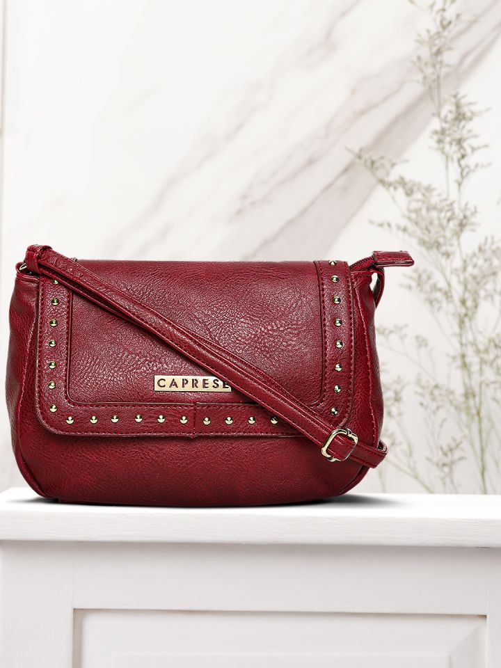 Caprese red sling bag on sale