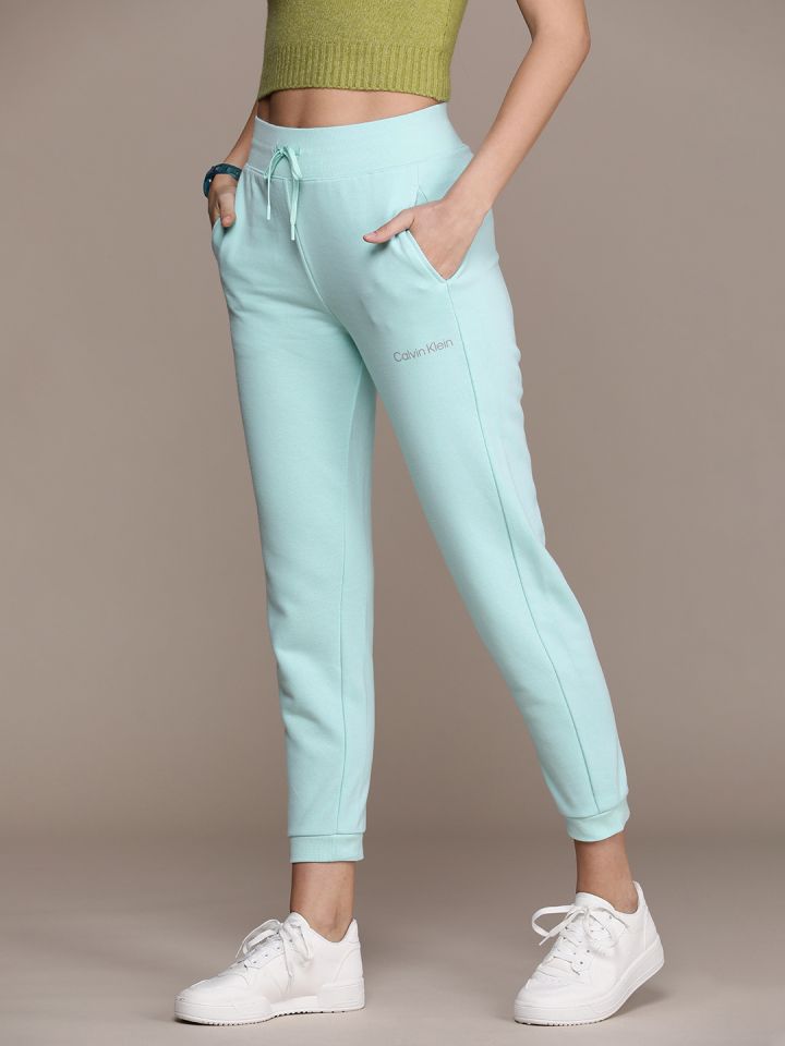 Buy Calvin Klein Jeans Women Solid Mid Rise Joggers Track