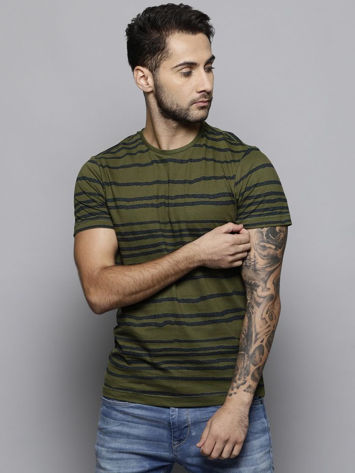 olive shirt with jeans