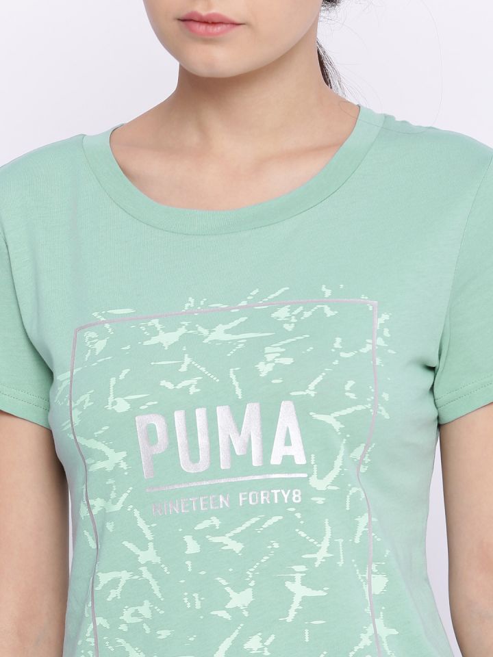 mint green puma shirt