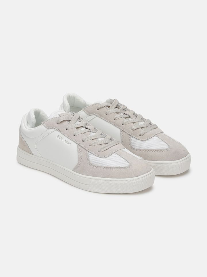Ucb white 2025 sneakers myntra