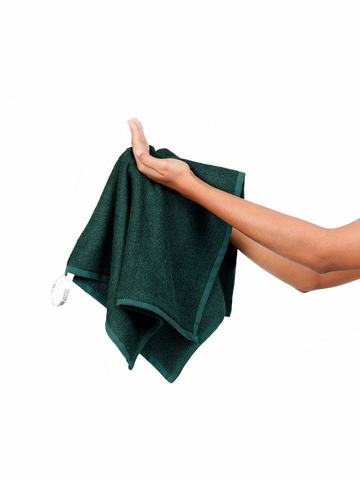 Next bottle top green towels