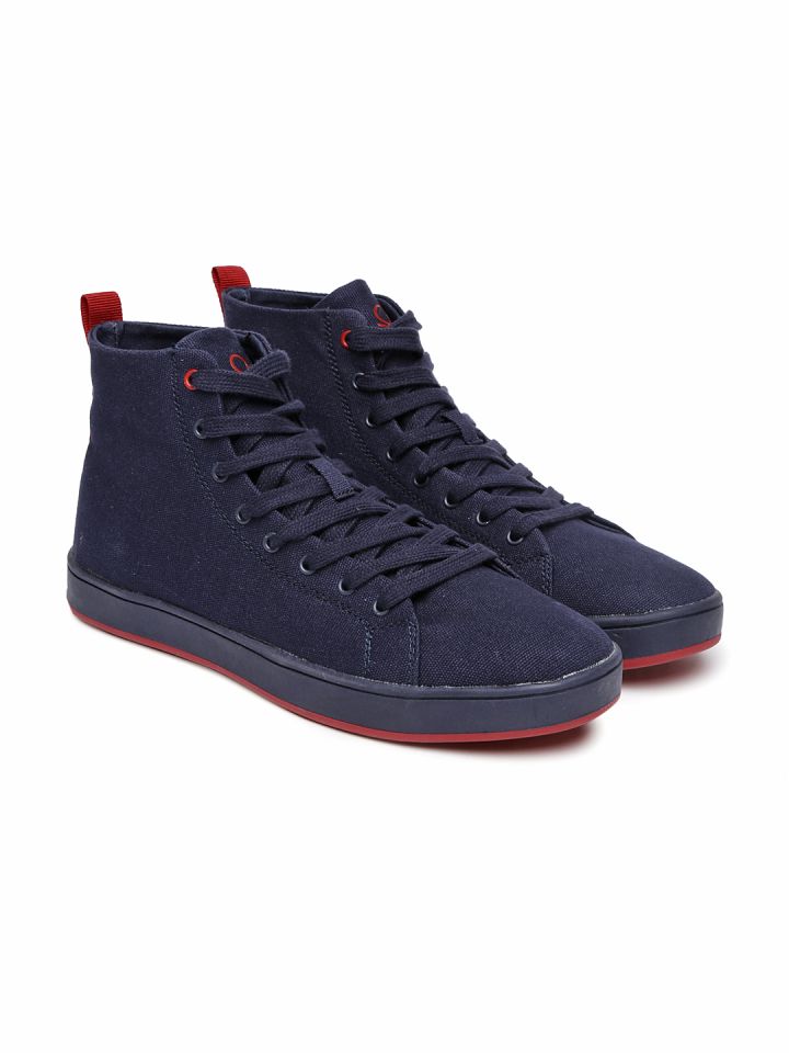 Ucb mid new arrivals top sneakers