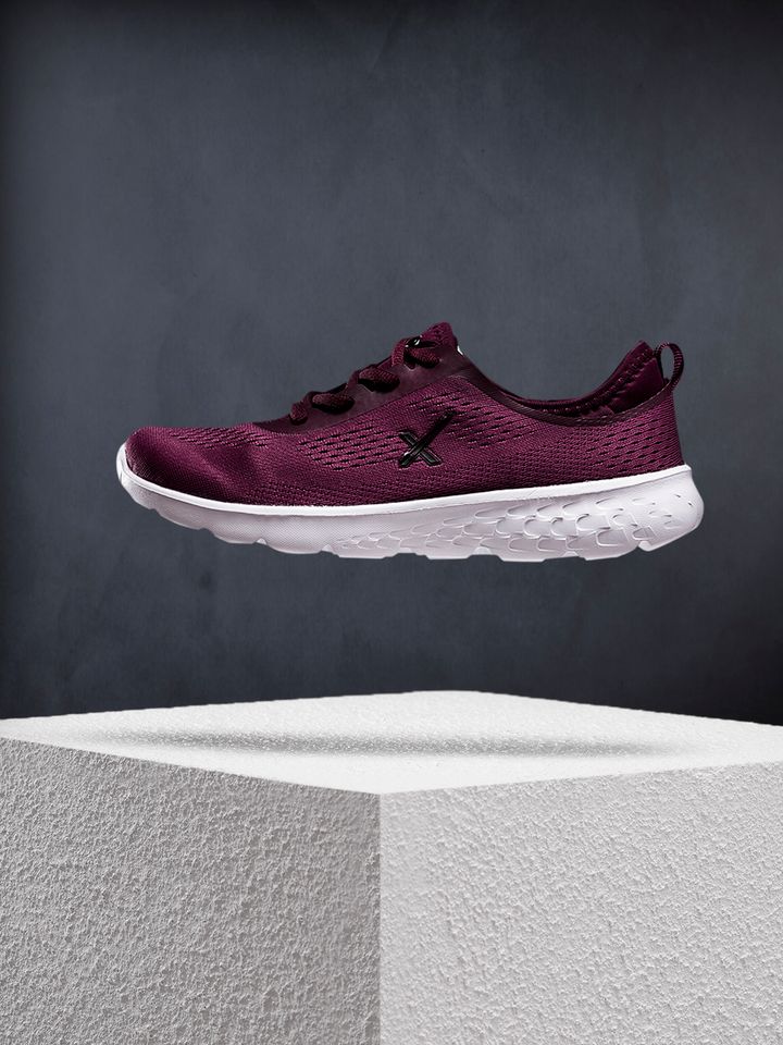 pink and purple running shoes