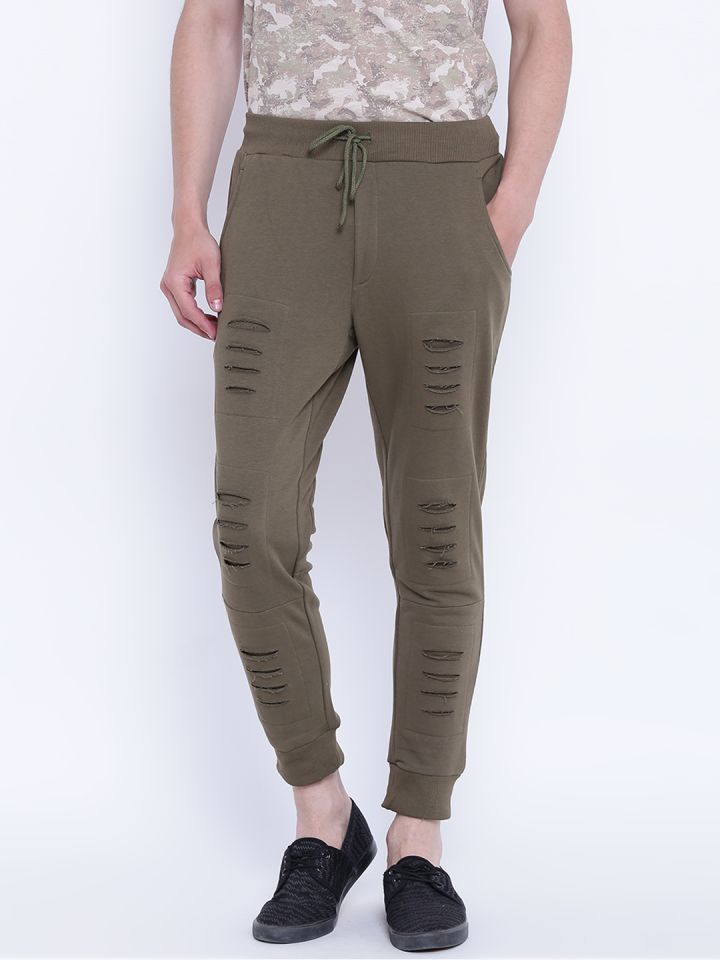 Distressed track pants deals