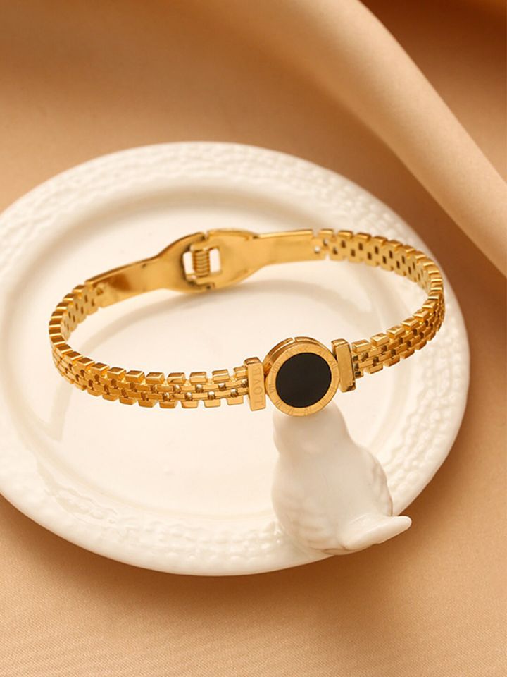 Gold bangle style bracelet on sale