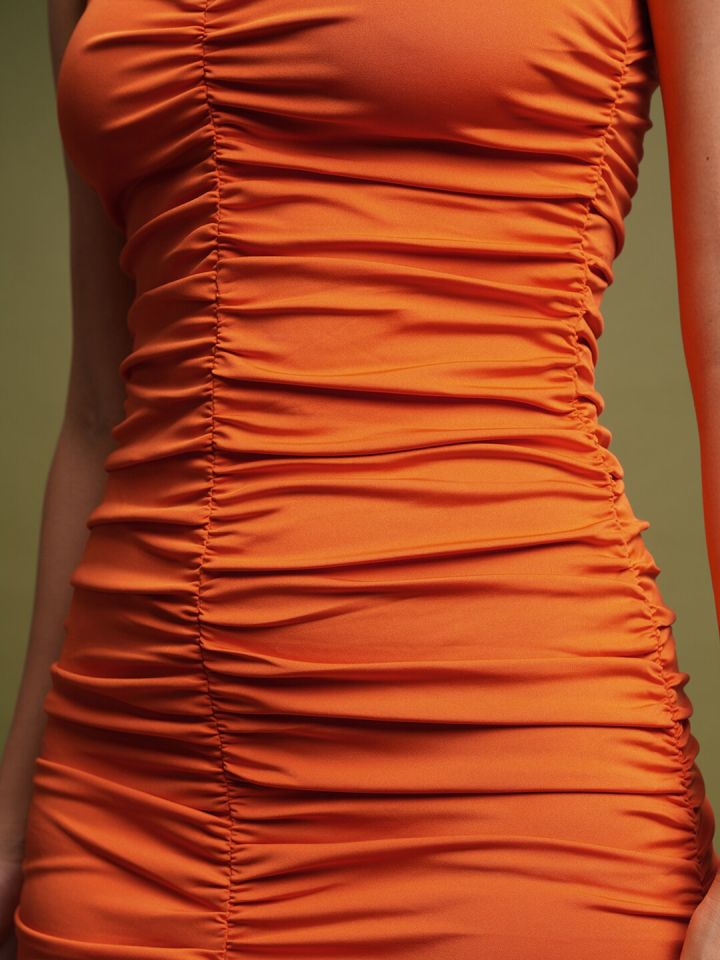 Orange ruched bodycon dress sales