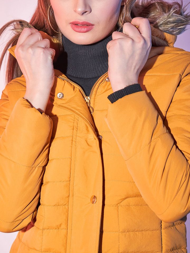 Orange puffer jacket with fur hood store