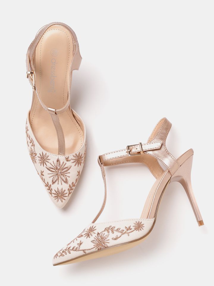 white and rose gold pumps