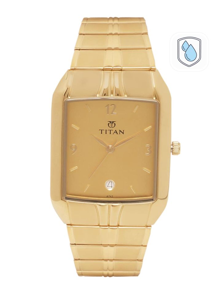 Titan gents gold watch top