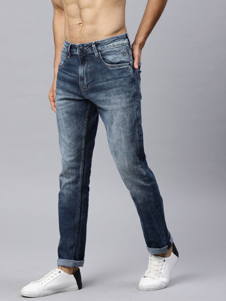 HRX by Hrithik Roshan Men Blue Tapered Fit Mid Rise Clean Look Stretchable Jeans