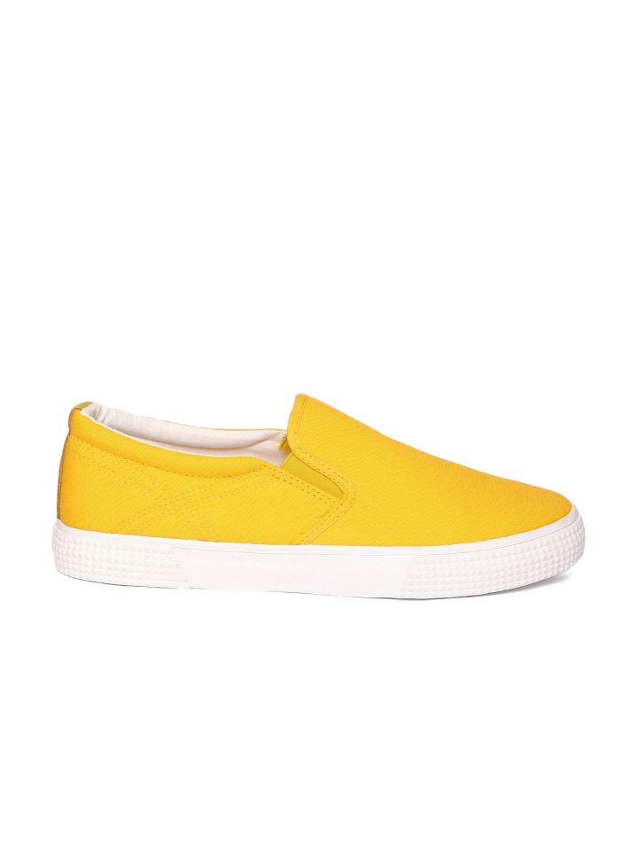 Yellow slip on best sale sneakers