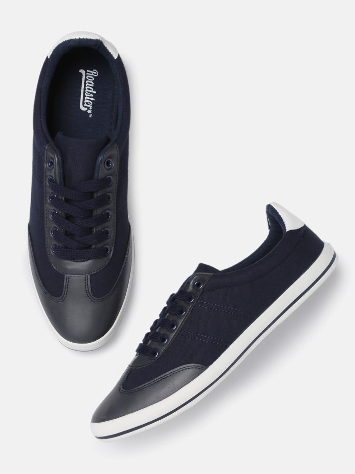 Navy blue and gray sneakers 2025