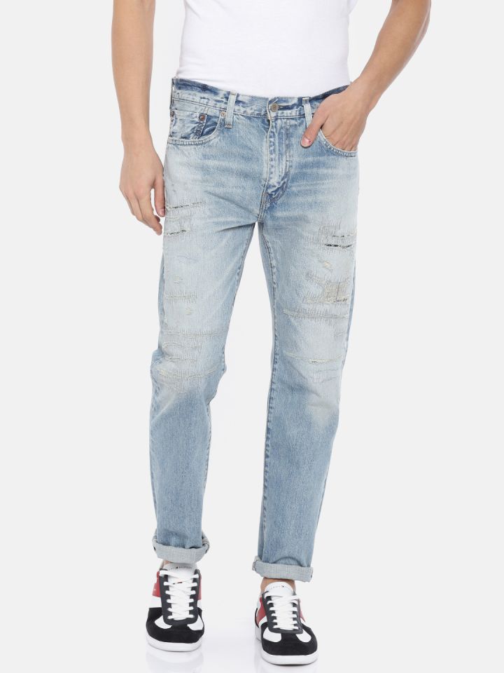 Buy Levis Men Blue 502 Tapered Fit Mid Rise Highly Distressed Jeans - Jeans  for Men 6841090 | Myntra