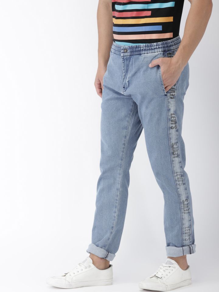 Buy Levis Men Blue Jogger Mid Rise Clean Look Stretchable Jeans 512 - Jeans  for Men 6841163 | Myntra