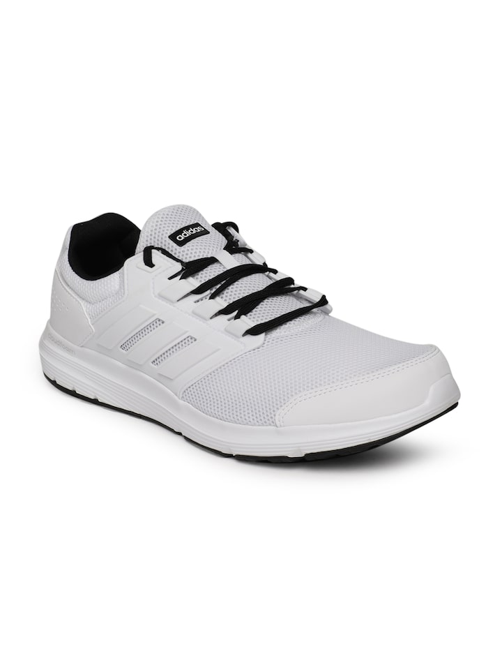 solid white running shoes