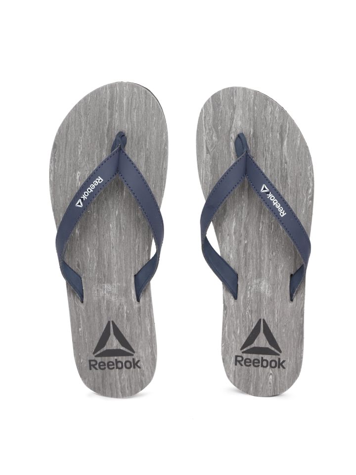 Reebok thong flip flops 2025