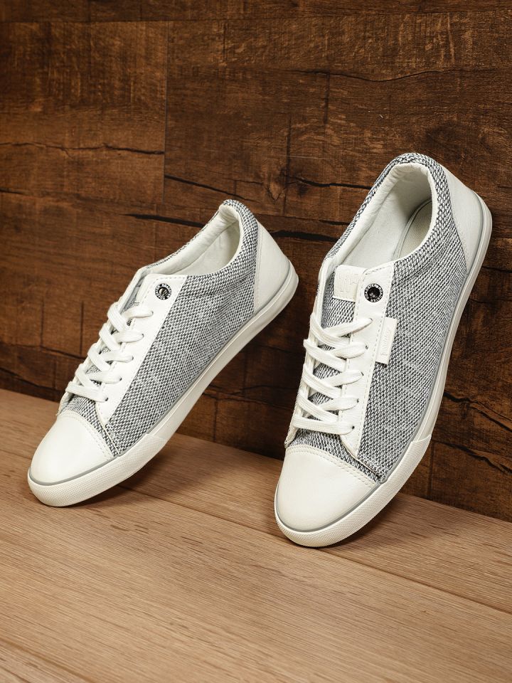 Roadster white outlet sneakers myntra