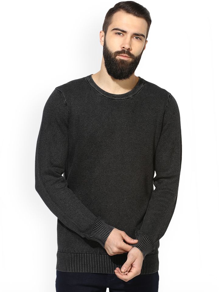 red tape black sweater