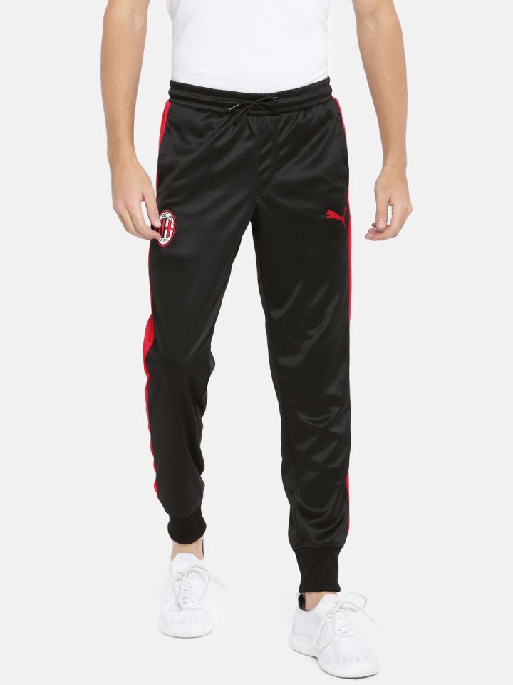 Buy Puma Men Black Solid AC Milan T7 Football Joggers Track
