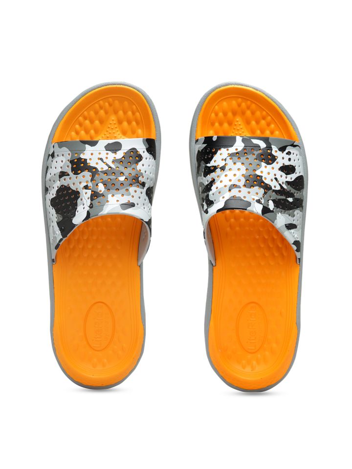 camo and orange crocs