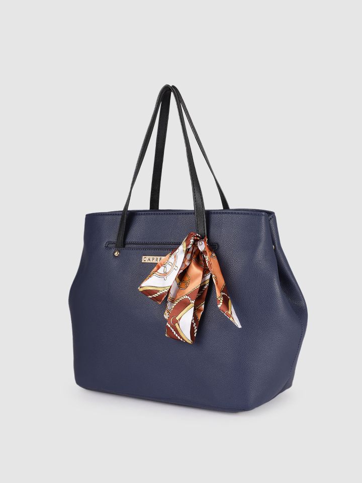 Caprese blue solid handheld bag shop
