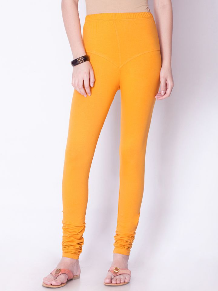 Buy Dollar Missy Women Mustard Orange Solid Churidar Leggings