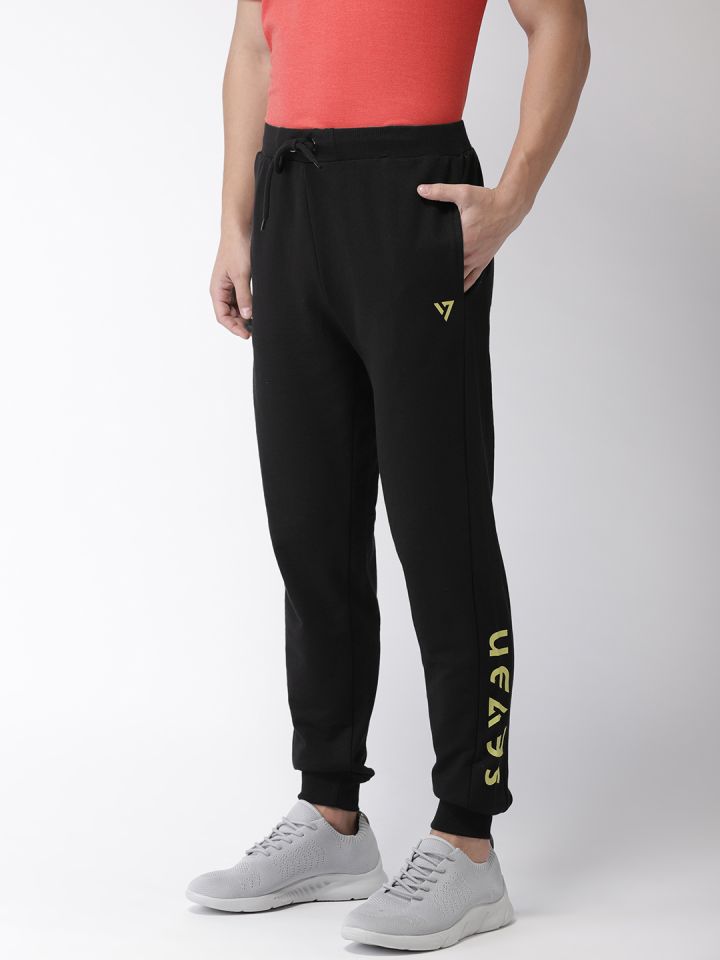 Buy SEVEN By MS Dhoni Men Black Solid Joggers Track Pants for
