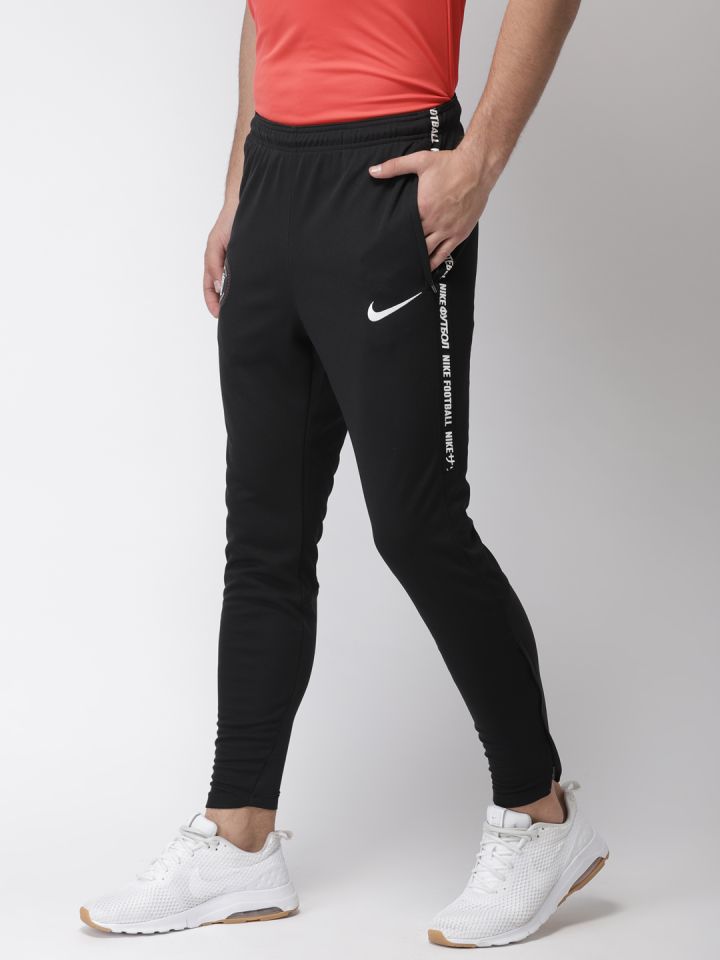 Nike football sweatpants on sale
