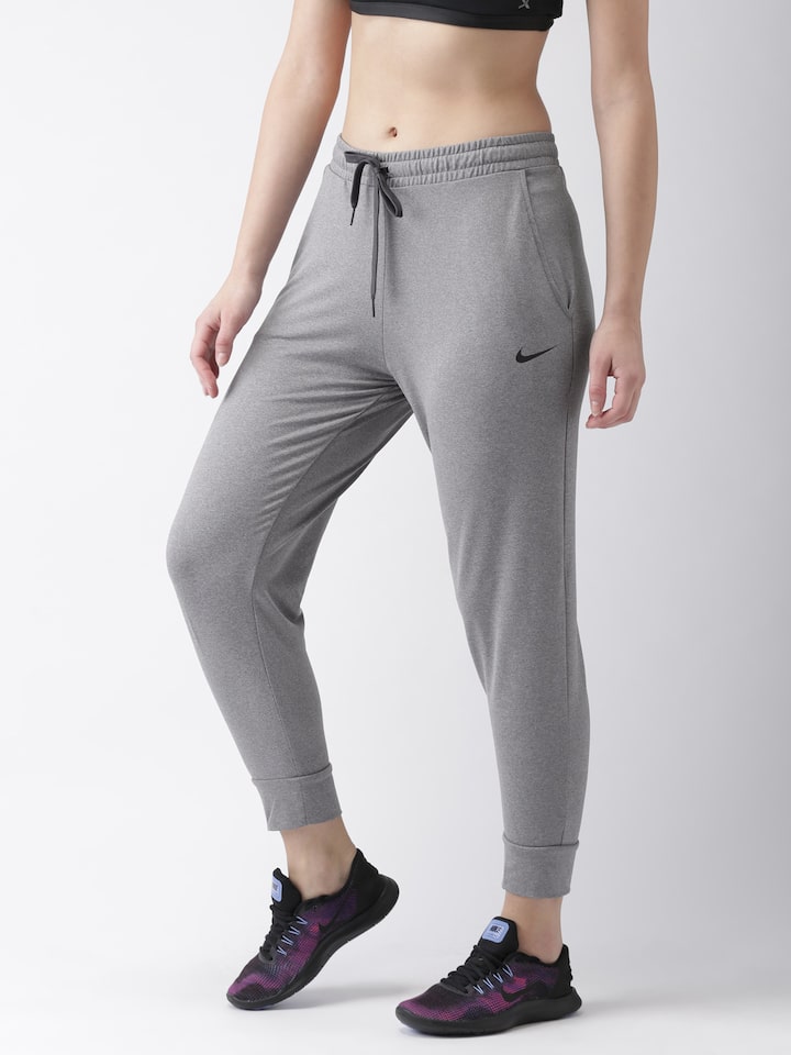 Buy Nike Women Grey Solid Loose Fit AS W NK DRY PANT TAPERED STDIO Joggers  - Track Pants for Women 7616662