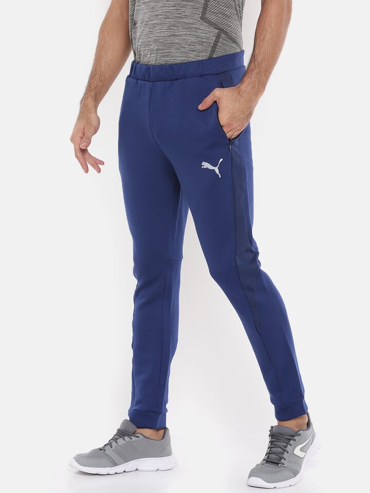 Arab voorjaar patroon Buy Puma Men Blue Regular Fit Evostripe Ultimate Solid Joggers - Track Pants  for Men 7748823 | Myntra