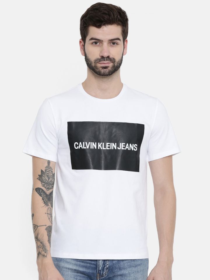 Buy Calvin Klein Jeans Men White & Black Printed Round Neck T Shirt -  Tshirts for Men 7766819 | Myntra
