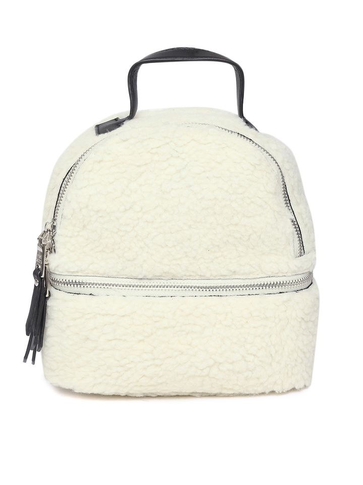white fuzzy backpack