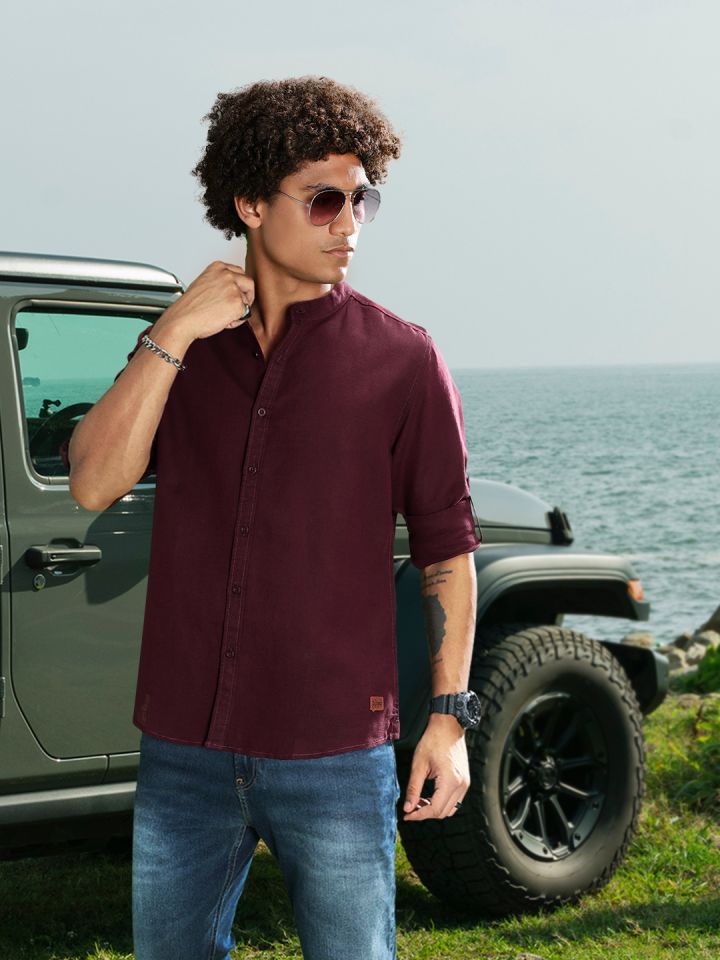 Black jeans with maroon shirt top