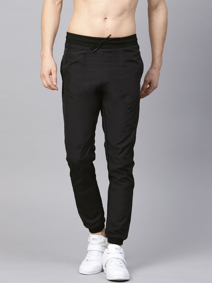 Buy HRX By Hrithik Roshan Men Black Solid Joggers Myntra