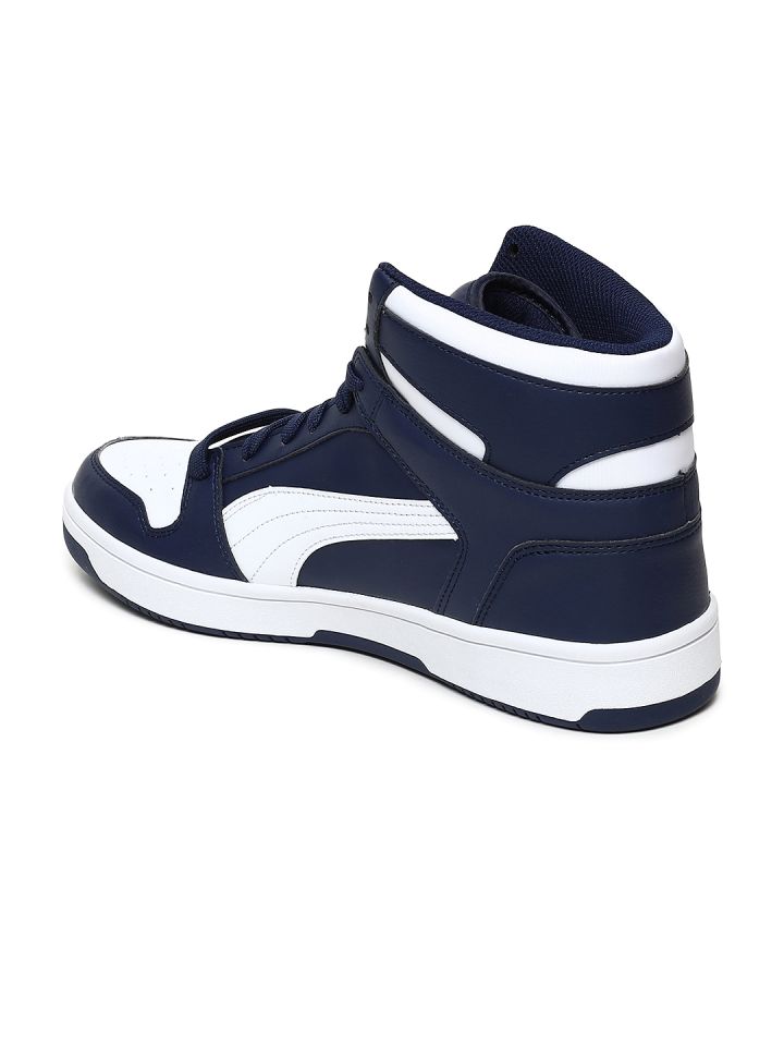 Navy blue sales high top pumas