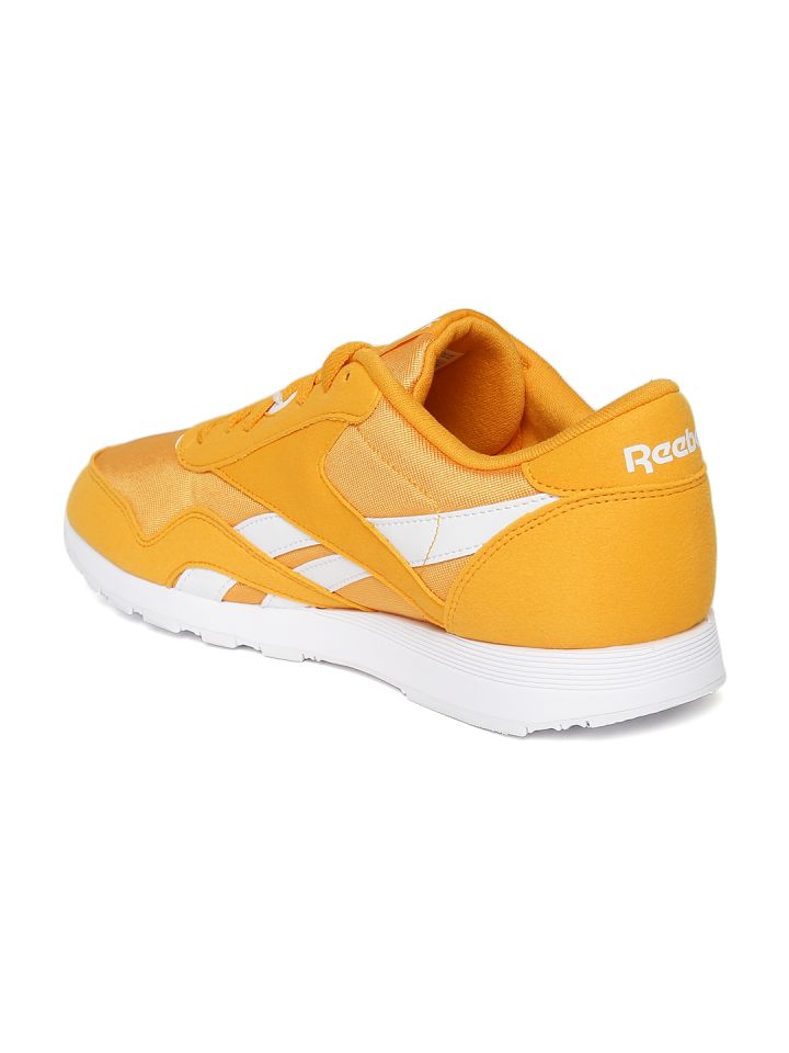 Orange store reebok trainers
