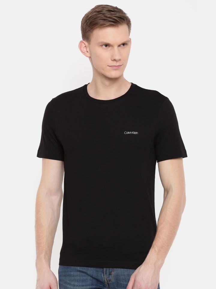 Buy Calvin Klein Jeans Men Black Solid Slim Fit Round Neck Pure Cotton T  Shirt - Tshirts for Men 8509433 | Myntra