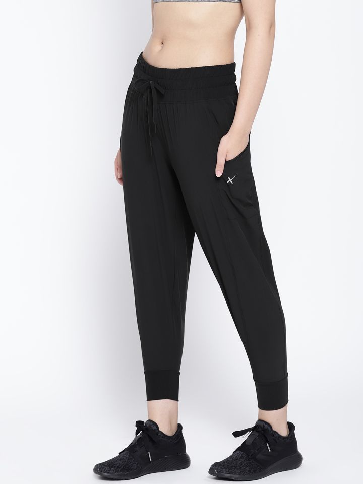 Buy Nike Women Grey Solid DRY FIT TAPERED NFS Track Pants  Track Pants for  Women 9164405  Myntra