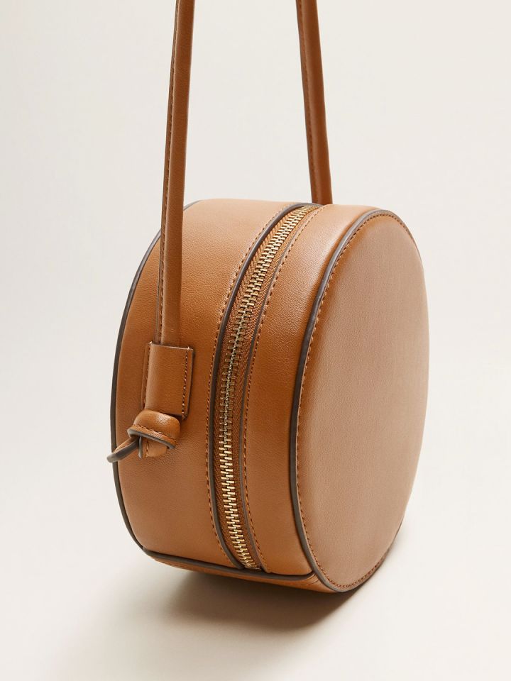 Round sling sale bag myntra