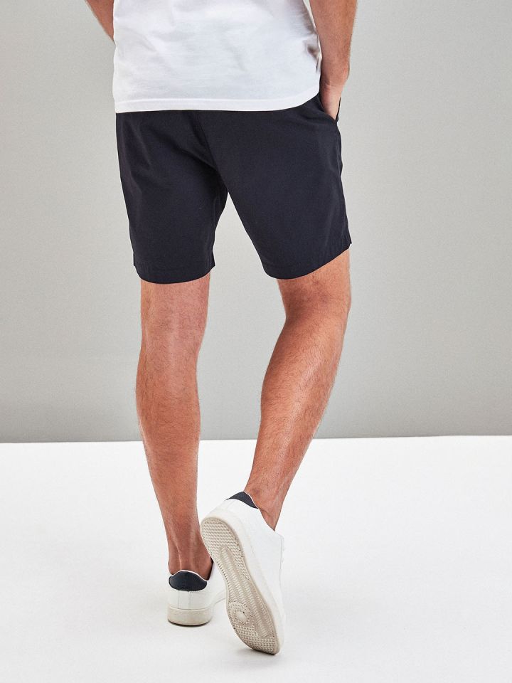 next slim chino shorts