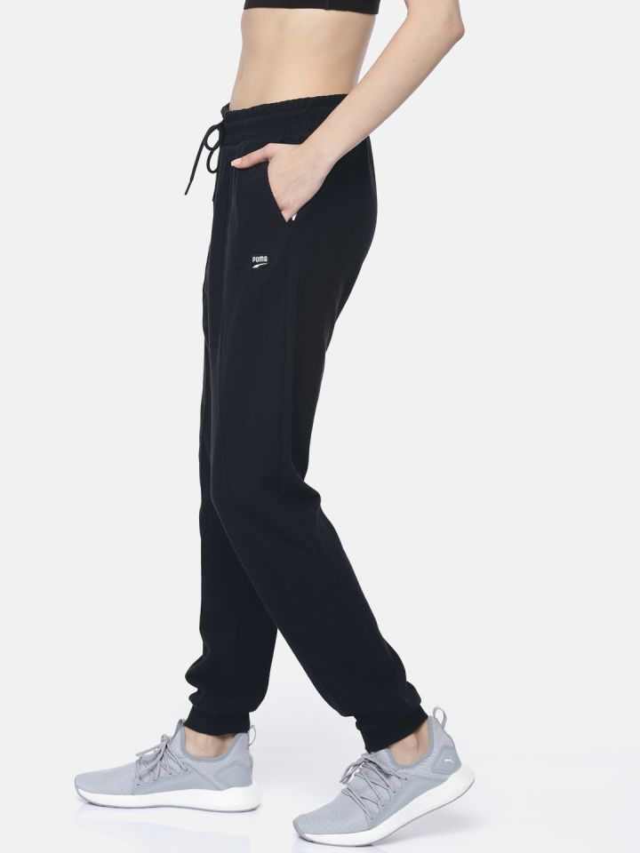 Buy Puma Women Black Self Design Downtown Tapered Joggers Track